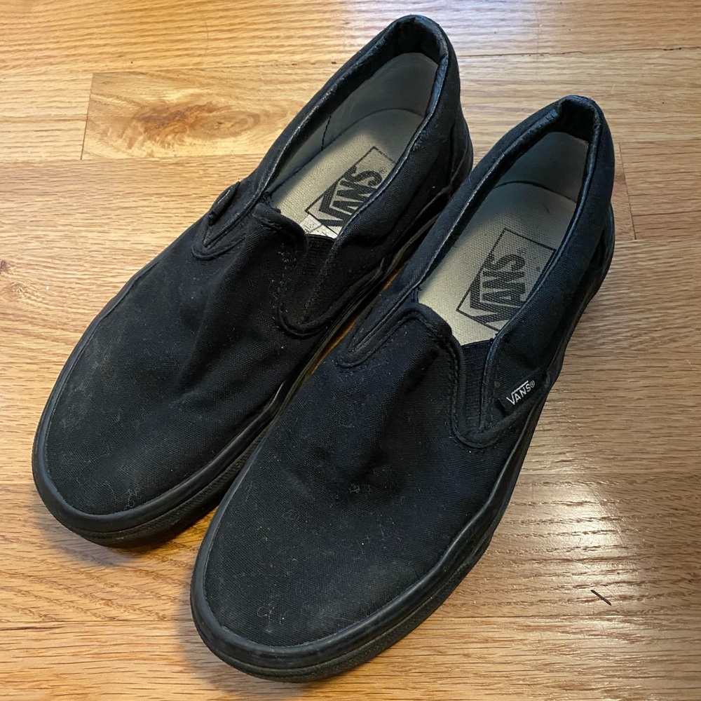 All black slip on Vans